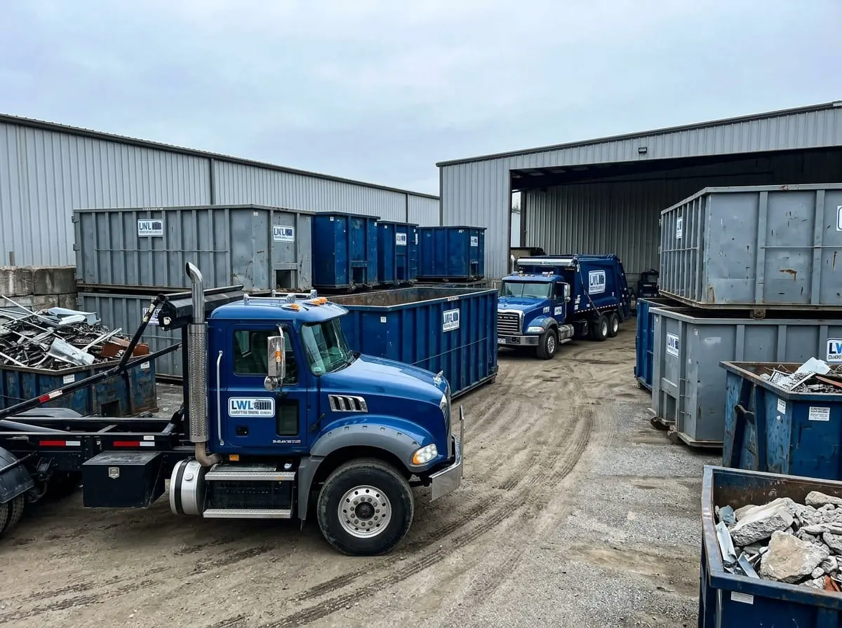 Massachusetts disposal rules and dumpster loading Loaded roll-off container in Lowell, MA